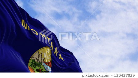 Close-up of Montana state flag waving the wind Close-up of Montana state flag waving the wind 120427029