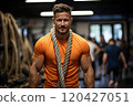 Male athlete with ropes on shoulders and chest. 120427051