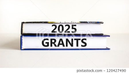 Planning 2025 grants new year symbol. Concept words 2025 Grants on beautiful books. Beautiful white background. Business 2025 grants new year concept. Copy space. 120427490