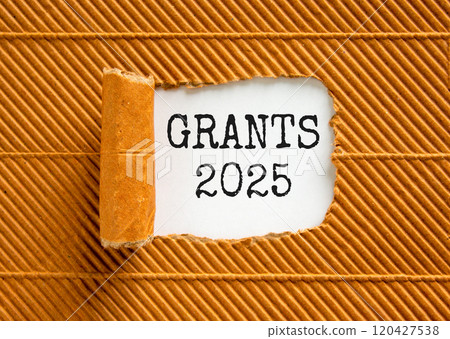 Planning grants 2025 new year symbol. Concept words Grants 2025 on beautiful white paper. Beautiful brown paper background. Business grants 2025 new year concept. Copy space. 120427538