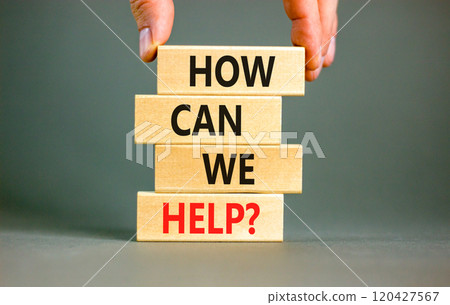 How can we help symbol. Concept words How can we help on beautiful wooden blocks. Beautiful grey table grey background. Businessman hand. Business and how can we help concept. Copy space. How can we help symbol. Concept words How can we help on beautiful wooden blocks. Beautiful grey table grey background. Businessman hand. Business and how can we help concept. Copy space. 120427567