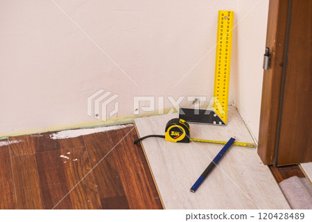 Renovations tools, tape measure, industrial ruler Renovations tools, tape measure, industrial ruler 120428489