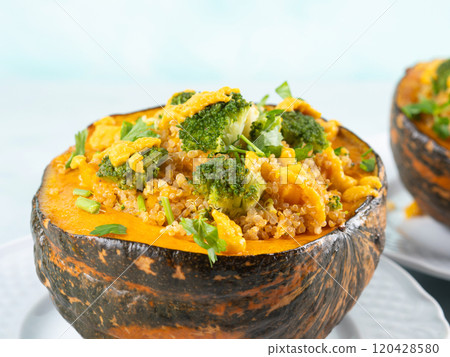 Stuffed kabocha squash with quinoa, broccoli and chickpea pumpkin hummus 120428580