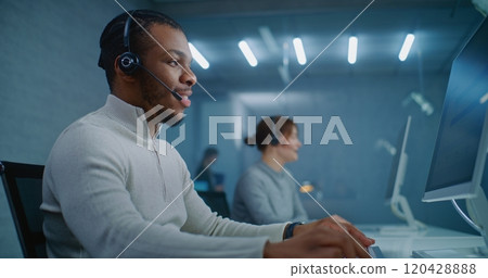 Call center office: African American technical support specialist provides online customer service 120428888