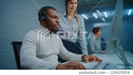Team of technical support specialists working in online customer support Team of technical support specialists working in online customer support 120428956