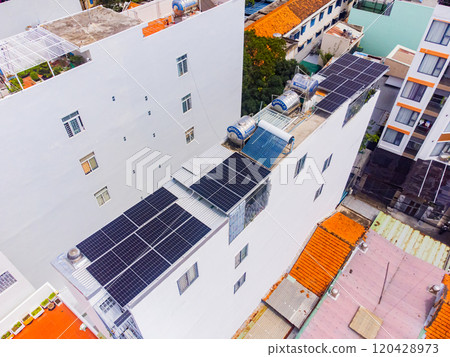 Solar panels on the roof of a Vietnamese house. Solar panels on the roof of a Vietnamese house. 120428973