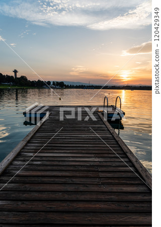Lake schwarzl sunset panorama schwarzlsee near the styrian capitol Graz in Austria. Lake schwarzl sunset panorama schwarzlsee near the styrian capitol Graz in Austria. 120429349