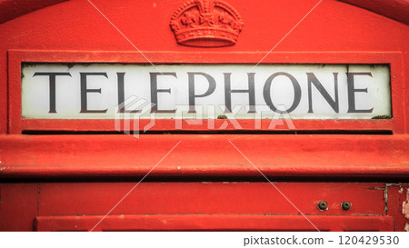 Closeup traditional red telephone box in UK Closeup traditional red telephone box in UK 120429530