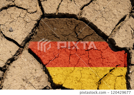 Drought. On dry, cracked ground, the image of the flag of Germany. Drought. On dry, cracked ground, the image of the flag of Germany. 120429677