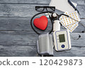 Red heart on the background of pills. Concept of health, heart disease. 120429873