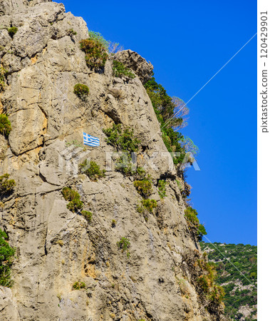 Greek flag in Taygetus mountains 120429901