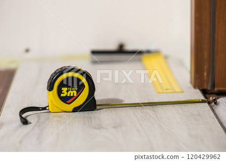 Renovations tools, tape measure, industrial ruler 120429962