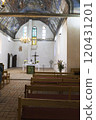 A church with a beautiful stained glass window and a cross altar 120431201