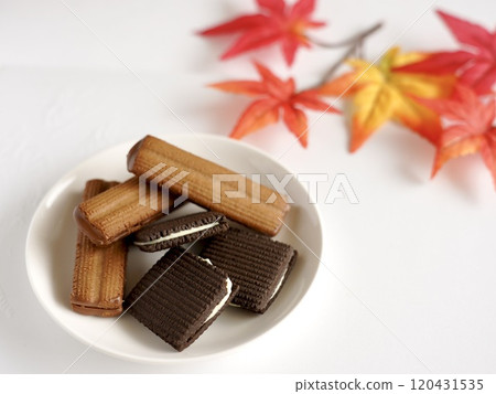 Cookies surrounded by autumn leaves Cookies surrounded by autumn leaves 120431535