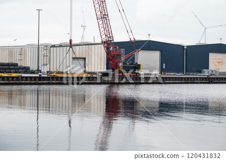 Loading cranes of the VCK Logistics company in the Bering and Suez port of Amsterdam, The Netherlands 120431832