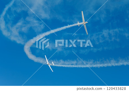 Stunt aerobatic plane performing stunts in air 120433828