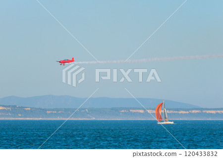 Stunt aerobatic plane performing stunts in air 120433832