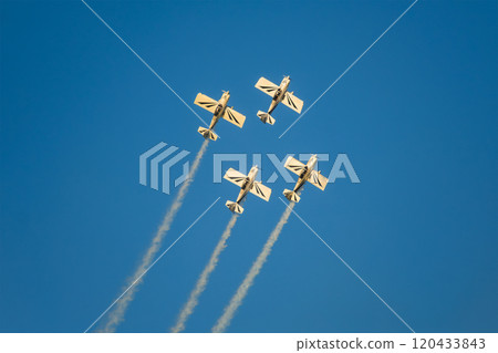 Stunt aerobatic planes performing stunts in air 120433843