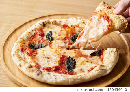 Pick up a freshly baked margherita 120434040