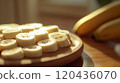 Picture of a plate of banana slices 120436070