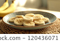 Picture of a plate of banana slices 120436071