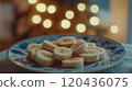 Picture of a plate of banana slices 120436075