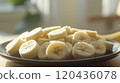Picture of a plate of banana slices 120436078