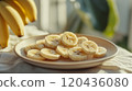 Picture of a plate of banana slices 120436080