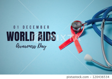 AIDS day, phonendoscope and red ribbon on a blue background with text 120436534