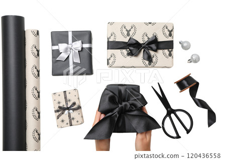 PNG, Christmas gifts, packing process, isolated on white background. 120436558