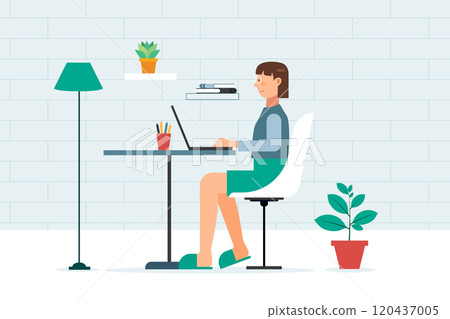Woman working at her desk at home 120437005
