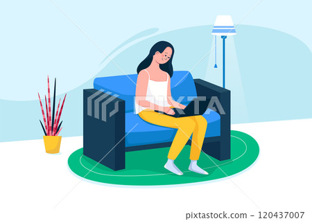 Woman with laptop at home sitting on sofa typing 120437007