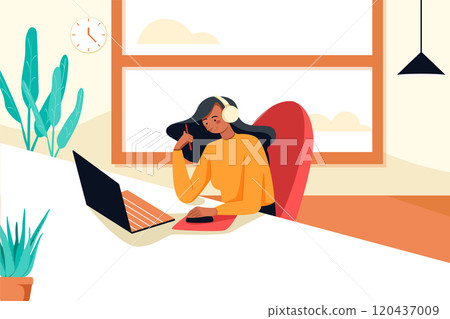 Smiling young woman sitting at her desk, using laptop computer for study, listening to music with headphones 120437009