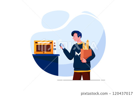 Happy young man looking at oven with voice recognition function in kitchen 120437017
