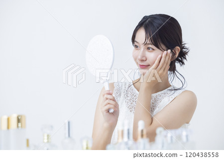 Beauty image: A woman doing skin care 120438558