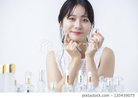Beauty image: A woman doing skin care 120439075