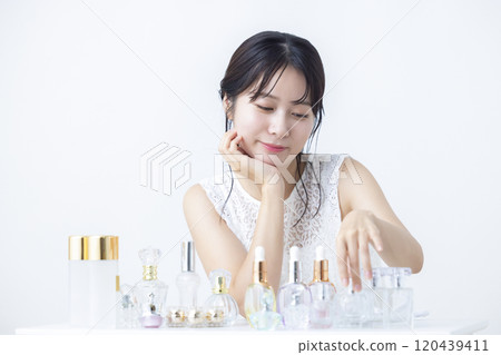 Beauty image: A woman doing skin care Beauty image: A woman doing skin care 120439411