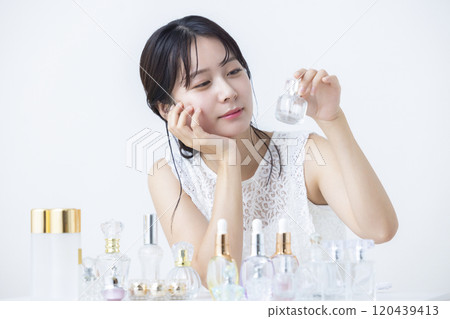 Beauty image: A woman doing skin care 120439413