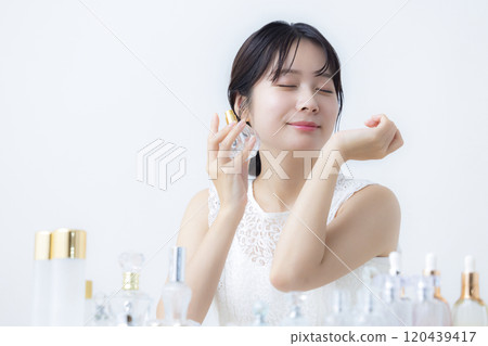 Beauty image: A woman doing skin care 120439417