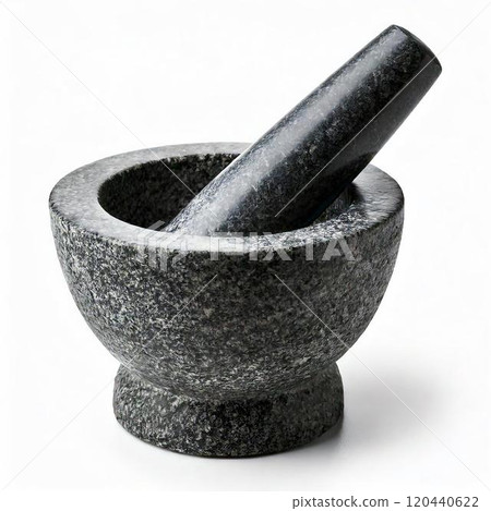 Elegant black stone mortar and pestle for grinding spices and herbal ingredients. 120440622