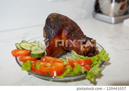 A beautifully arranged plate of food with meat and veggies for all 120441057