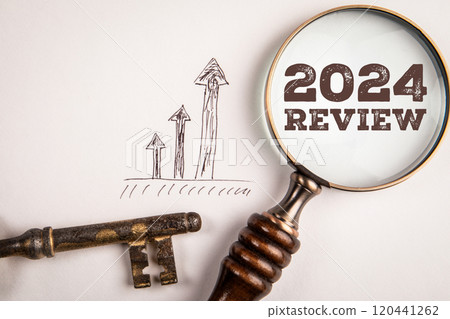 2024 Review. Magnifying glass and key on white background 2024 Review. Magnifying glass and key on white background 120441262