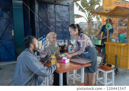 Dining Experience at a Cozy Caf with Friendly Service 120441547
