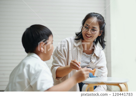 Mother Teaching Son Art Craft at Home Mother Teaching Son Art Craft at Home 120441783