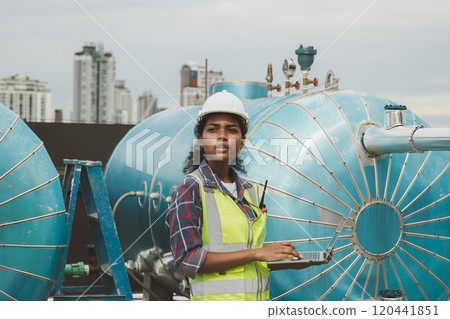 Industrial engineer work on site. engineer visit and inspection site engineer at industrial site. Inspector engineer check and working on site 120441851