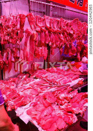 Pork sold at a butcher shop in the Hong Kong market. Higher and more expensive than beef and chicken. Chinese love pork Pork sold at a butcher shop in the Hong Kong market. Higher and more expensive than beef and chicken. Chinese love pork 120442965