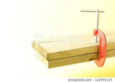 Clamp the lumber to hold it in place 120443125