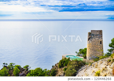 Spanish sea coast with tower, Andalusia 120446268