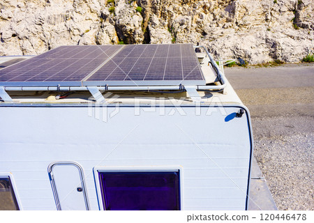 Dirty solar photovoltaic panel on caravan roof 120446478