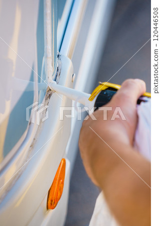 Applying silicon on caravan body Applying silicon on caravan body 120446508